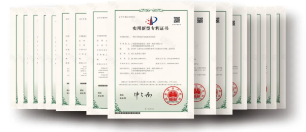 Collection of Chinese utility-model patent certificates arranged in overlapping rows.